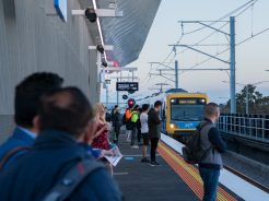 Passengers wait to board services at the new Reservoir Station