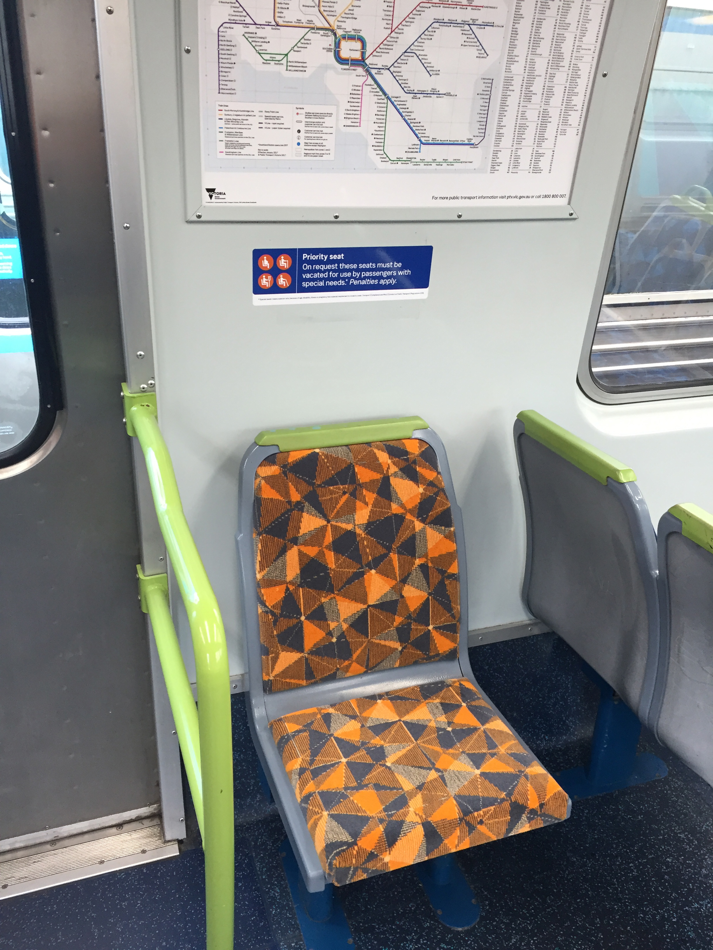 Photo of allocated spaces that are identified by orange seats