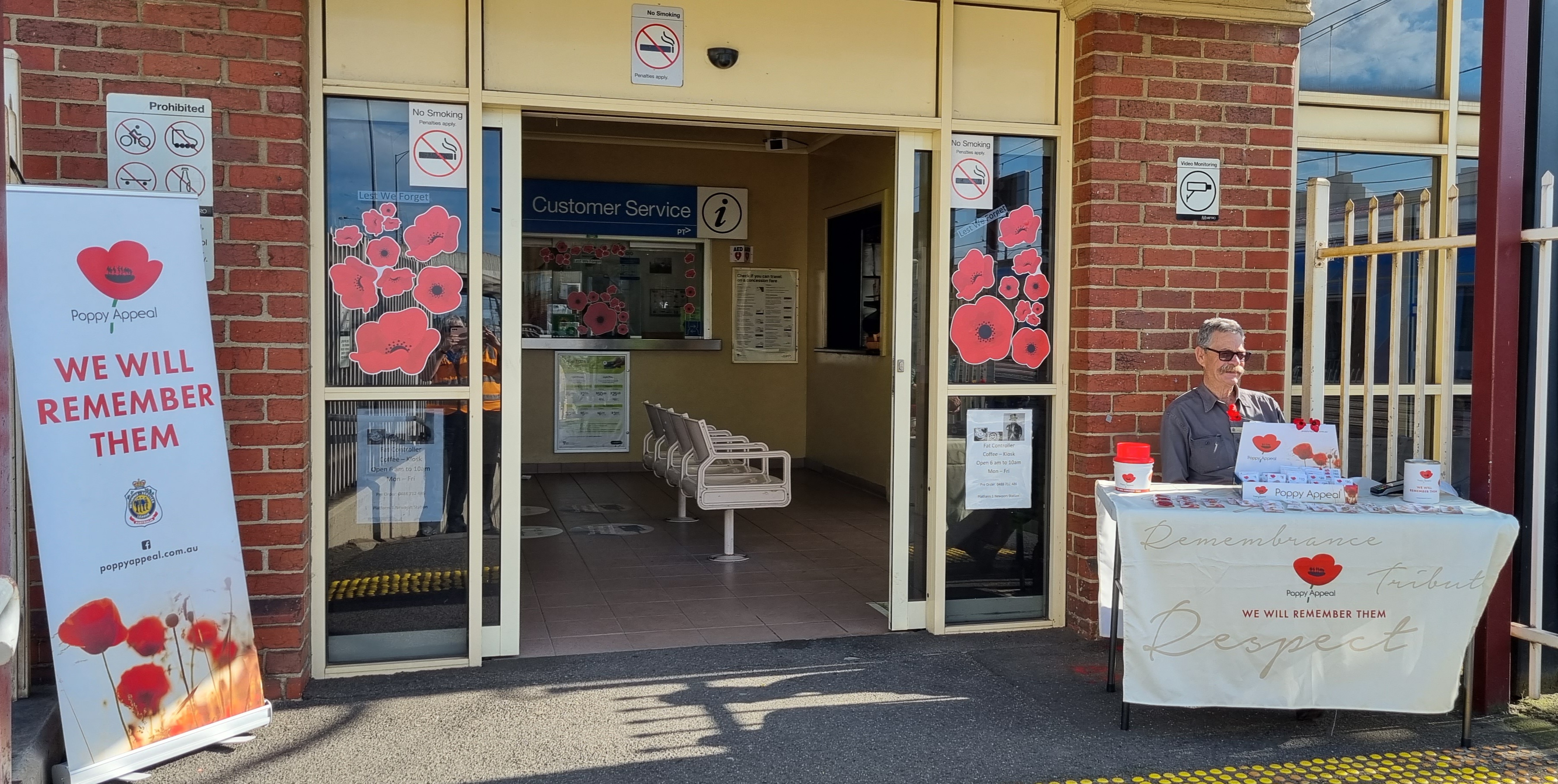 Selling poppies at Newport Station. 